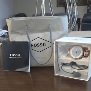 Fossil Hybrid Smartwatch HR in Rose GOLD AND RHINESTONE.